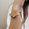 POM: Golden Cross Over Hinged Bangle