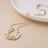 POM: Golden Wave Pendant Necklace