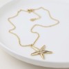 POM: Golden Starfish Necklace