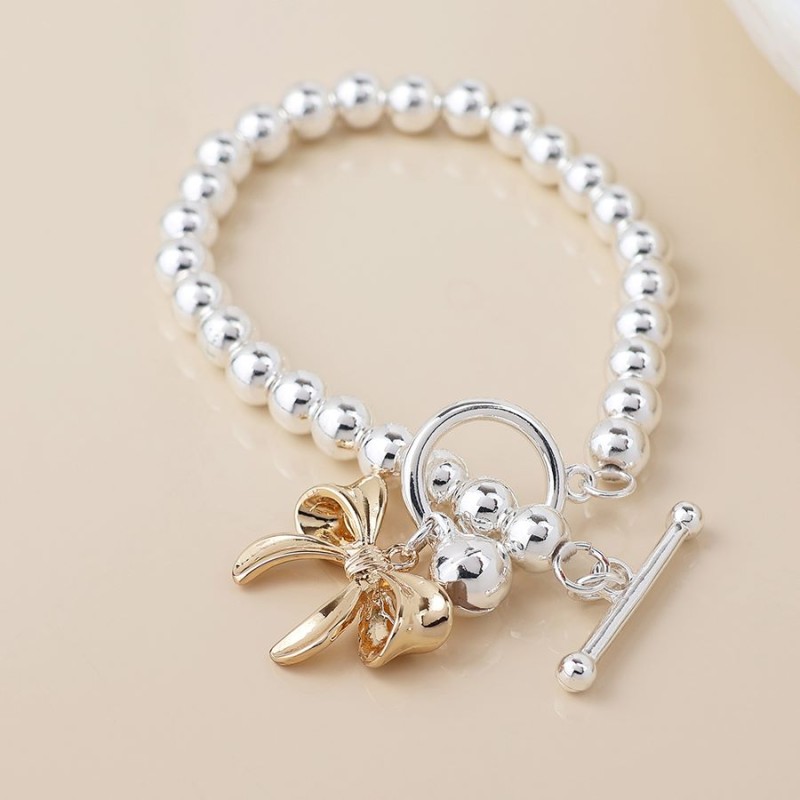 POM: Silver Plated Bead Bracelet with Golden Bow Charm