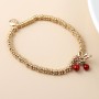 POM: Golden Bracelet with Cherry, Beads & Bow Charm