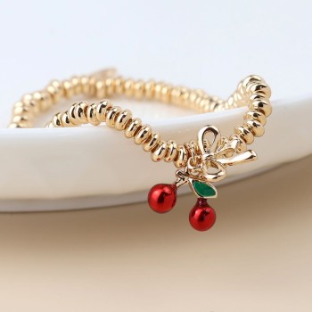POM: Golden Bracelet with Cherry, Beads & Bow Charm