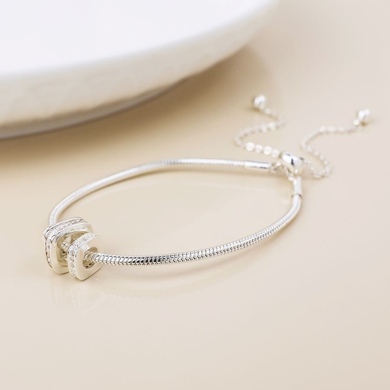 POM: Silver Plated Rings on Snake Chain Bracelet