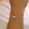 POM: Silver Plated Rings on Snake Chain Bracelet