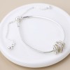 POM: Silver Plated Rings on Snake Chain Bracelet