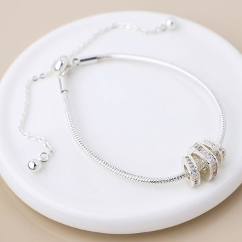 POM: Silver Plated Rings on Snake Chain Bracelet
